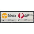 AUSTRALIA - 1975 10c Post & Telecom pair, perf. 14½:14, MNH – SG # 600a