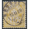 SWITZERLAND - 1882 15c yellow Cross & Numeral, granite paper, oval watermark (Kz. I), used – Zumstein # 63Aa